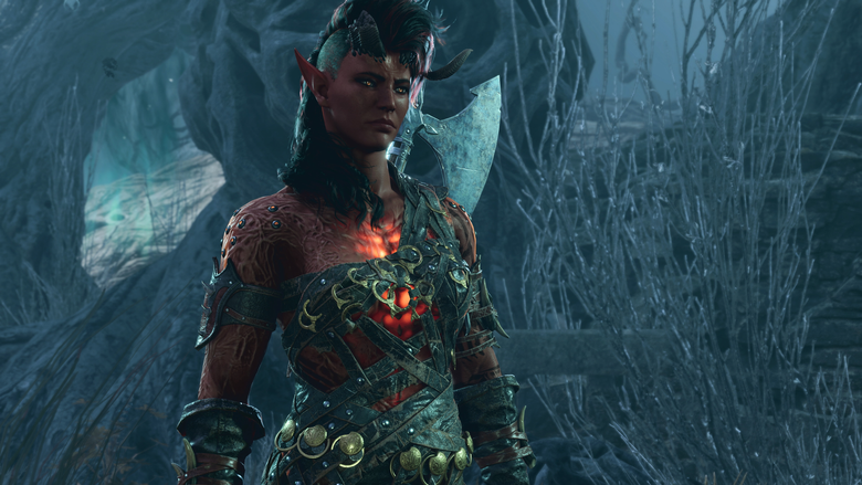 Karlach from Baldur’s Gate 3, a horned tiefling warrior with an axe, stands in a dark webbed cavern.