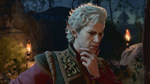 White-haired elf companion Astarion looks thoughtful in a torchlit forest camp in Baldur’s Gate 3.