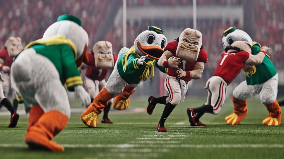 Mascot-style players chase a ball carrier during a College Football 27 Mascot Mashup game.