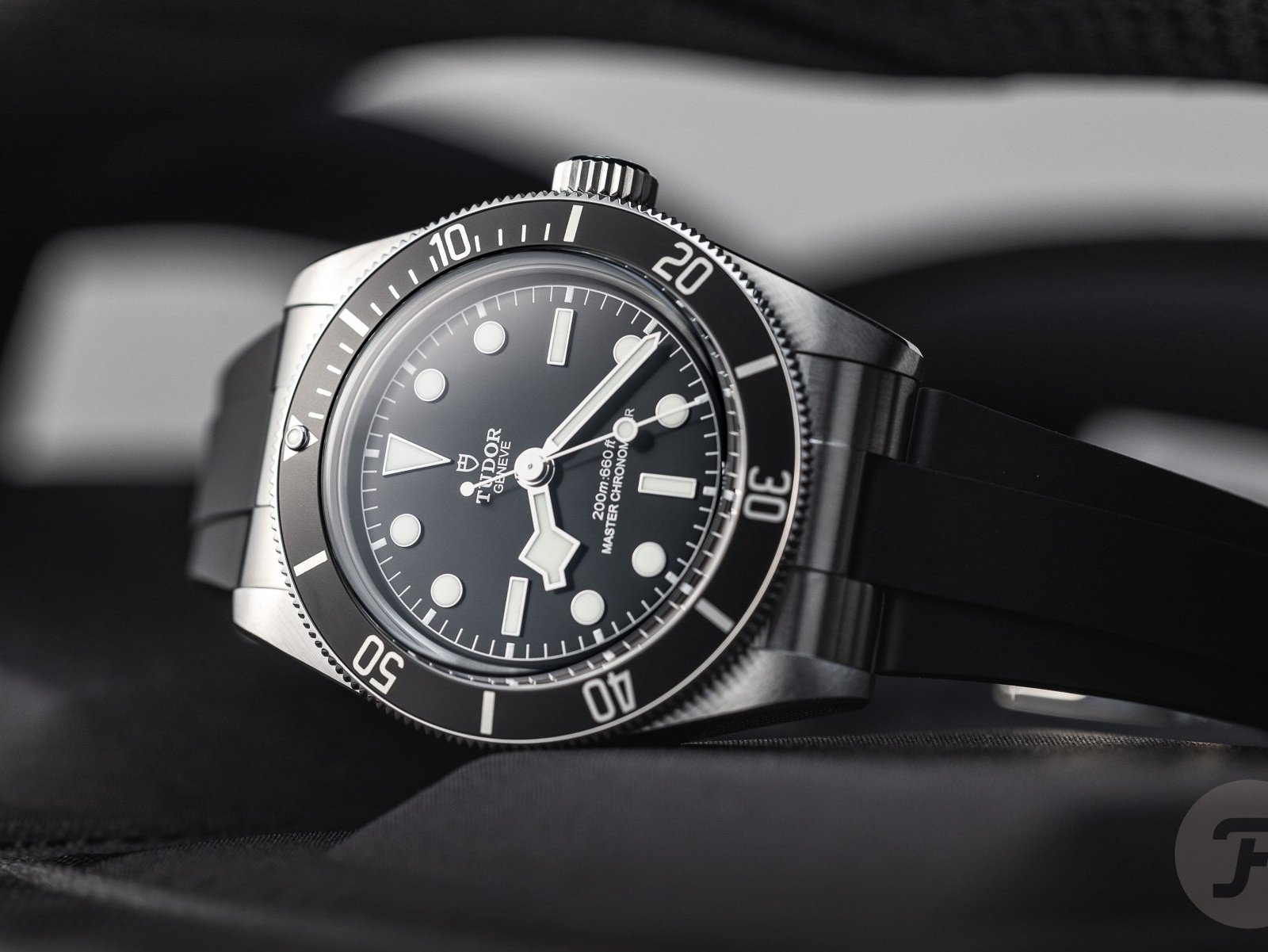 Tudor Black Bay METAS watch with black dial and bezel shown in close-up